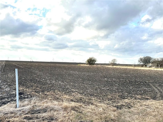 view of yard with a rural view