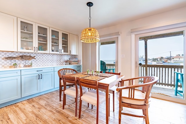 dining area featuring light wood-type flooring