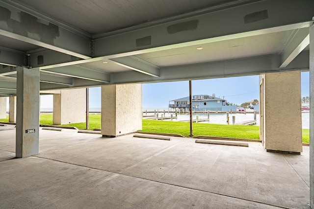 view of patio with a water view