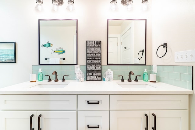 bathroom featuring decorative backsplash and vanity