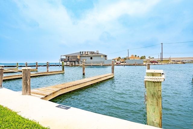 dock area featuring a water view