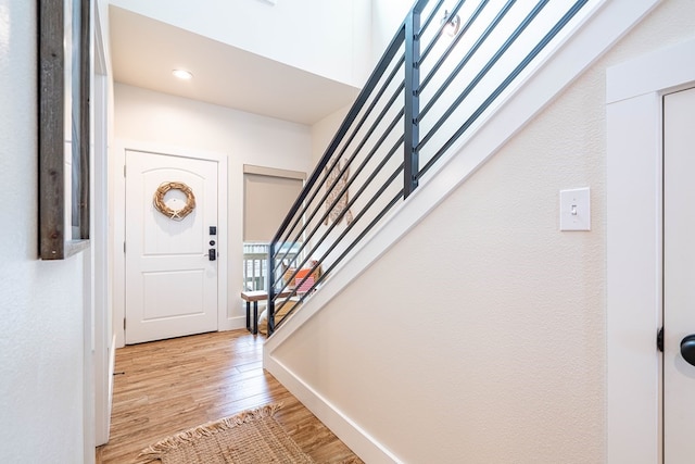 entrance foyer with light wood-type flooring