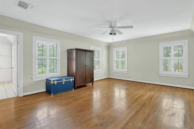 521 Del Mar Blvd, Corpus Christi, TX 78404 - unfurnished bedroom featuring wood finished floors and ceiling fan