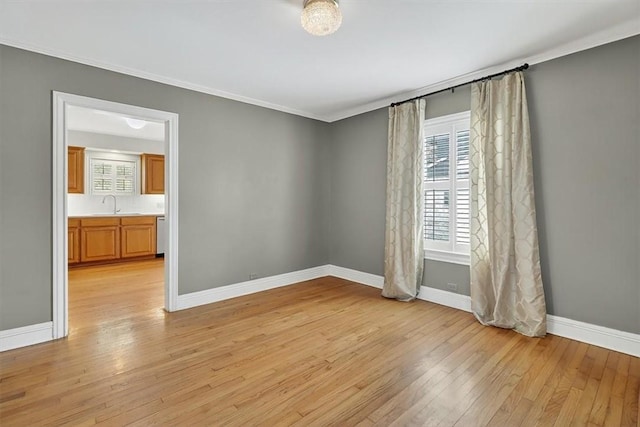 521 Del Mar Blvd, Corpus Christi, TX 78404 - unfurnished room featuring light wood-type flooring and ornamental molding