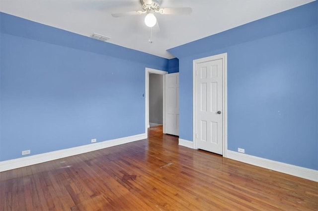 521 Del Mar Blvd, Corpus Christi, TX 78404 - unfurnished room with ceiling fan and wood finished floors