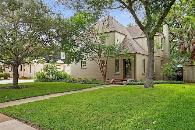 521 Del Mar Blvd, Corpus Christi, TX 78404 - tudor-style house with stucco siding and a shingled roof