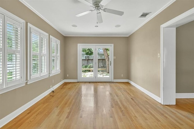 521 Del Mar Blvd, Corpus Christi, TX 78404 - unfurnished room featuring light wood-style flooring, crown molding, and a ceiling fan