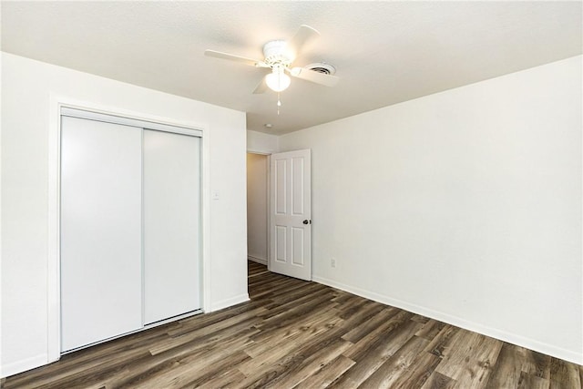 3033 Elgin St, Corpus Christi, TX 78405 - unfurnished bedroom with wood finished floors, a closet, and ceiling fan