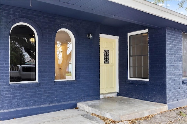 3033 Elgin St, Corpus Christi, TX 78405 - doorway to property featuring brick siding