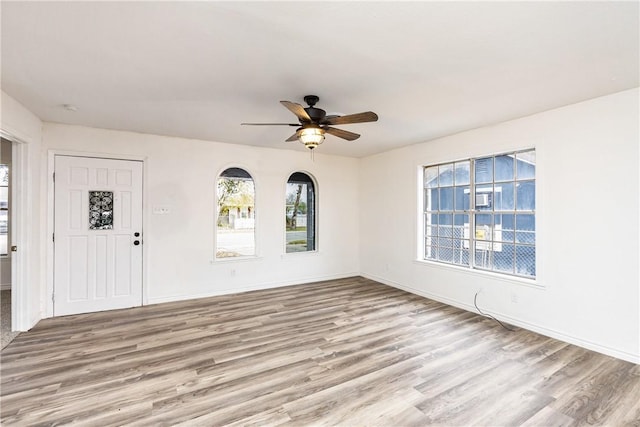 3033 Elgin St, Corpus Christi, TX 78405 - foyer with light wood-style flooring, plenty of natural light, and a ceiling fan