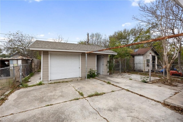 3033 Elgin St, Corpus Christi, TX 78405 - single story home featuring an outdoor structure, driveway, a garage, and a shingled roof