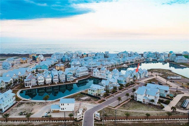 drone / aerial view with a water view