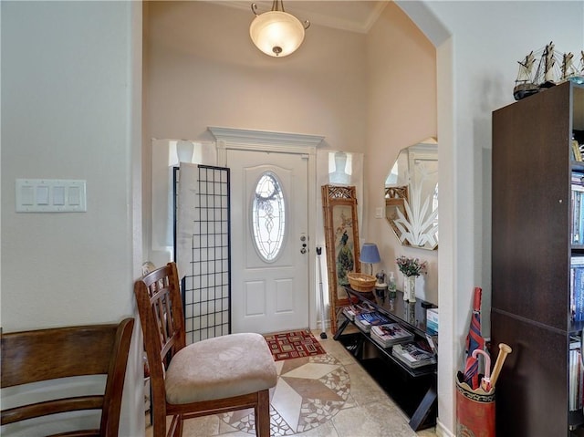 13838 Sea Horse Ave, Corpus Christi, TX 78418 - tiled foyer entrance featuring arched walkways and crown molding