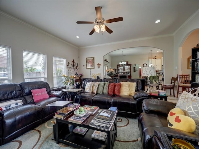 13838 Sea Horse Ave, Corpus Christi, TX 78418 - living room featuring arched walkways, ceiling fan, a chandelier, crown molding, and recessed lighting