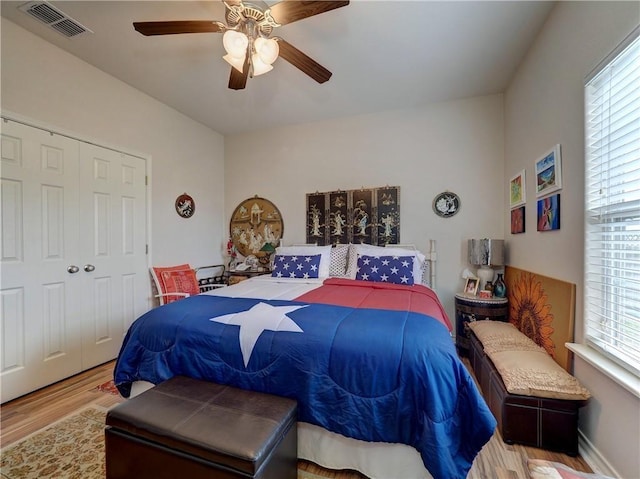 13838 Sea Horse Ave, Corpus Christi, TX 78418 - bedroom with wood finished floors, a closet, and ceiling fan