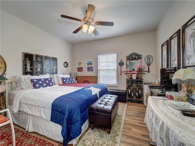 13838 Sea Horse Ave, Corpus Christi, TX 78418 - bedroom featuring wood finished floors and ceiling fan