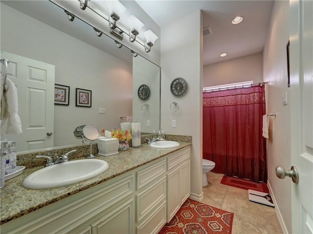 13838 Sea Horse Ave, Corpus Christi, TX 78418 - bathroom featuring double vanity, a shower with curtain, tile patterned floors, and recessed lighting