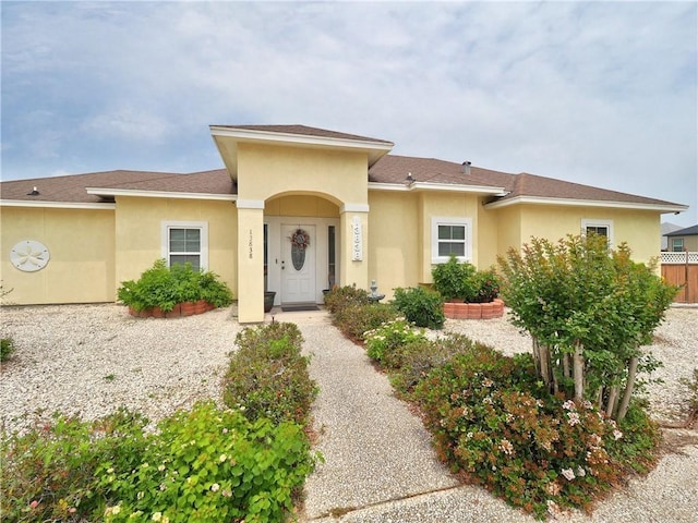 13838 Sea Horse Ave, Corpus Christi, TX 78418 - view of front facade featuring stucco siding