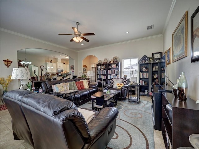 13838 Sea Horse Ave, Corpus Christi, TX 78418 - living room featuring arched walkways, a ceiling fan, and ornamental molding
