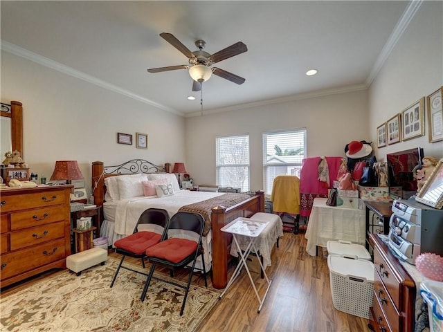 13838 Sea Horse Ave, Corpus Christi, TX 78418 - bedroom featuring wood finished floors, crown molding, recessed lighting, and a ceiling fan