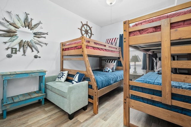 bedroom with wood finished floors