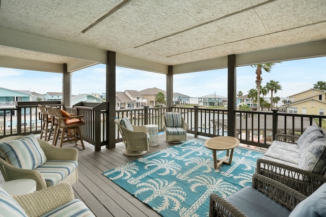 wooden deck with a residential view