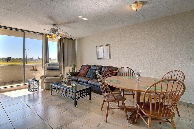 dining room featuring ceiling fan