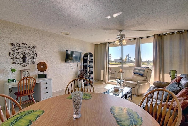 dining area with ceiling fan