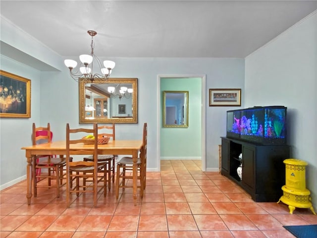 tiled dining space with a chandelier