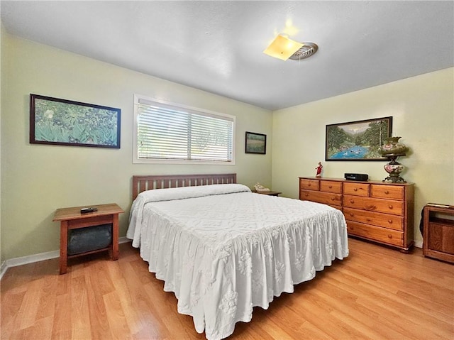 bedroom featuring light hardwood / wood-style floors