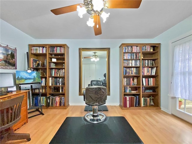 home office with hardwood / wood-style floors