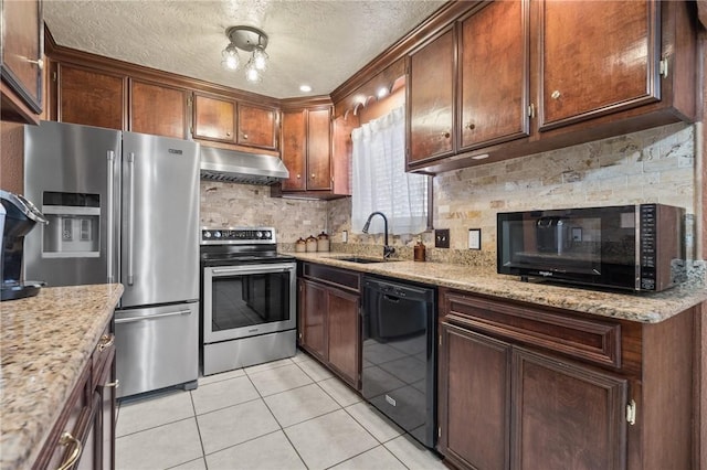 1317 Easthaven Dr, Corpus Christi, TX 78412 - kitchen featuring black appliances, under cabinet range hood, a sink, decorative backsplash, and light tile patterned floors