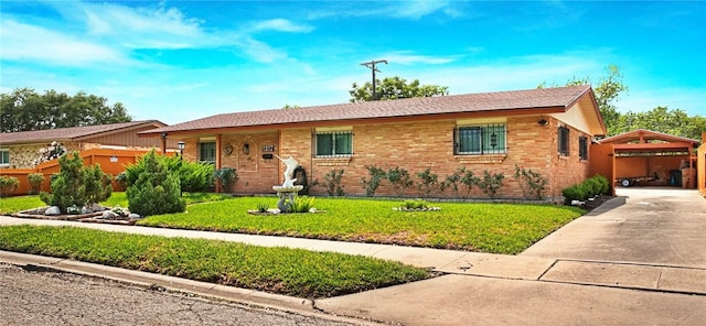 1317 Easthaven Dr, Corpus Christi, TX 78412 - ranch-style home featuring a front lawn, driveway, and brick siding