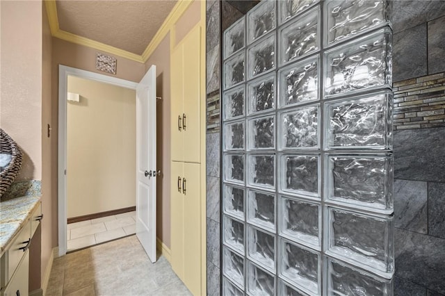 1317 Easthaven Dr, Corpus Christi, TX 78412 - full bathroom with ornamental molding, vanity, a walk in shower, and tile patterned floors