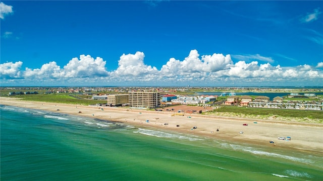 aerial view with a view of the beach and a water view