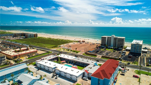 drone / aerial view with a view of the beach and a water view