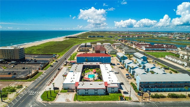 bird's eye view with a beach view and a water view