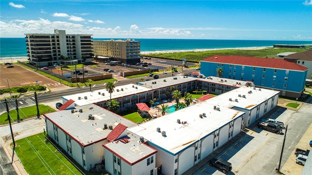 aerial view featuring a view of the beach and a water view