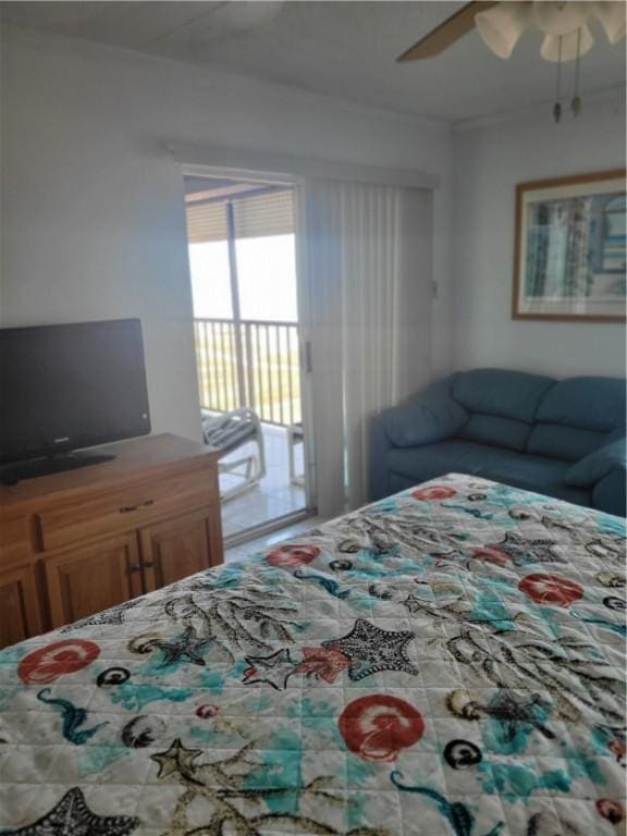 bedroom featuring access to exterior and a ceiling fan