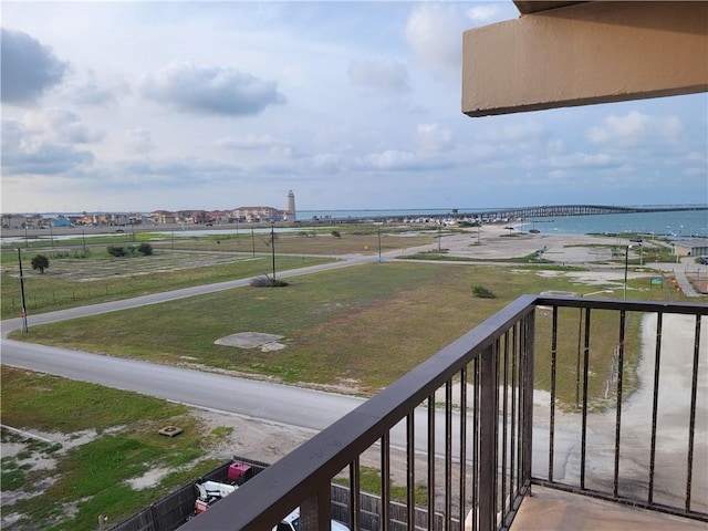 balcony featuring a water view