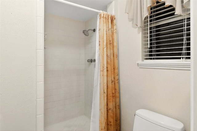 4634 Bonner Dr, Corpus Christi, TX 78411 - full bathroom with toilet and a shower stall