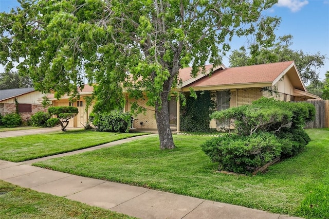 4634 Bonner Dr, Corpus Christi, TX 78411 - obstructed view of property featuring brick siding