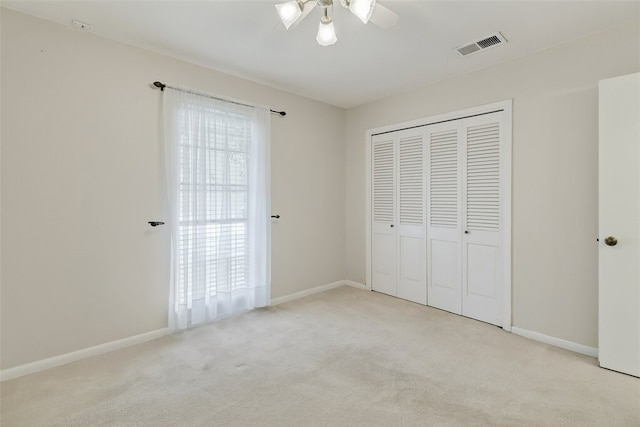 4634 Bonner Dr, Corpus Christi, TX 78411 - unfurnished bedroom featuring carpet floors, a closet, and ceiling fan