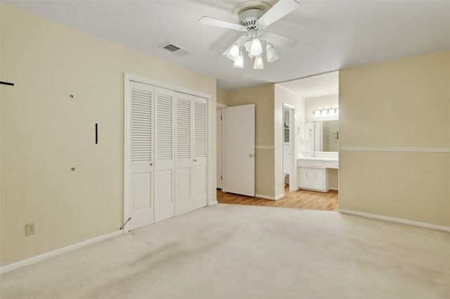 4634 Bonner Dr, Corpus Christi, TX 78411 - unfurnished bedroom featuring carpet floors, a closet, ensuite bath, and a ceiling fan