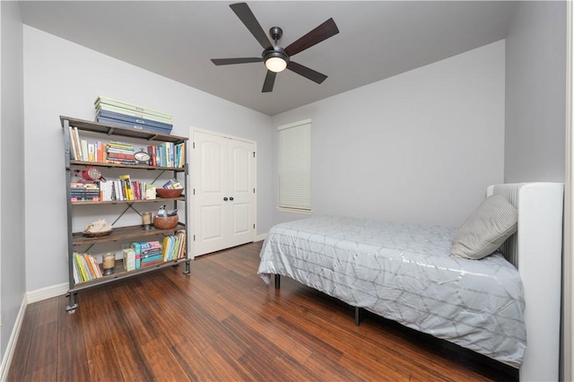 5806 Lago Vista Dr, Corpus Christi, TX 78414 - bedroom with wood finished floors, baseboards, a closet, and ceiling fan