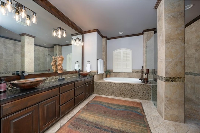 5806 Lago Vista Dr, Corpus Christi, TX 78414 - bathroom with ornamental molding, a bath, double vanity, ornate columns, and a tile shower