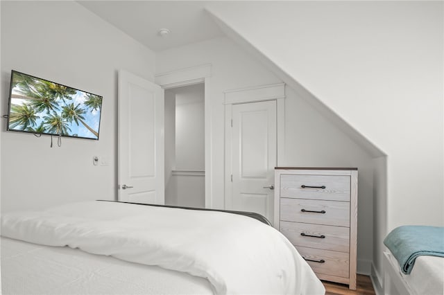 bedroom with wood-type flooring