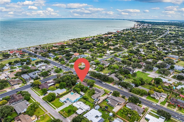 birds eye view of property featuring a water view