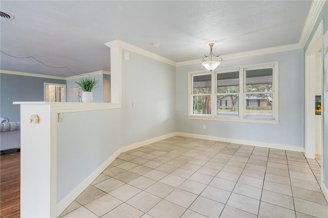310 Doddridge St, Corpus Christi, TX 78411 - spare room featuring ornamental molding, baseboards, and light tile patterned floors