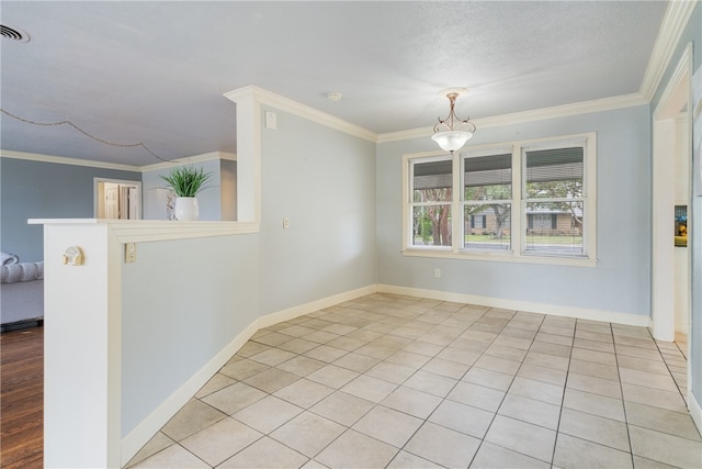 empty room featuring visible vents, crown molding, baseboards, and light tile patterned flooring